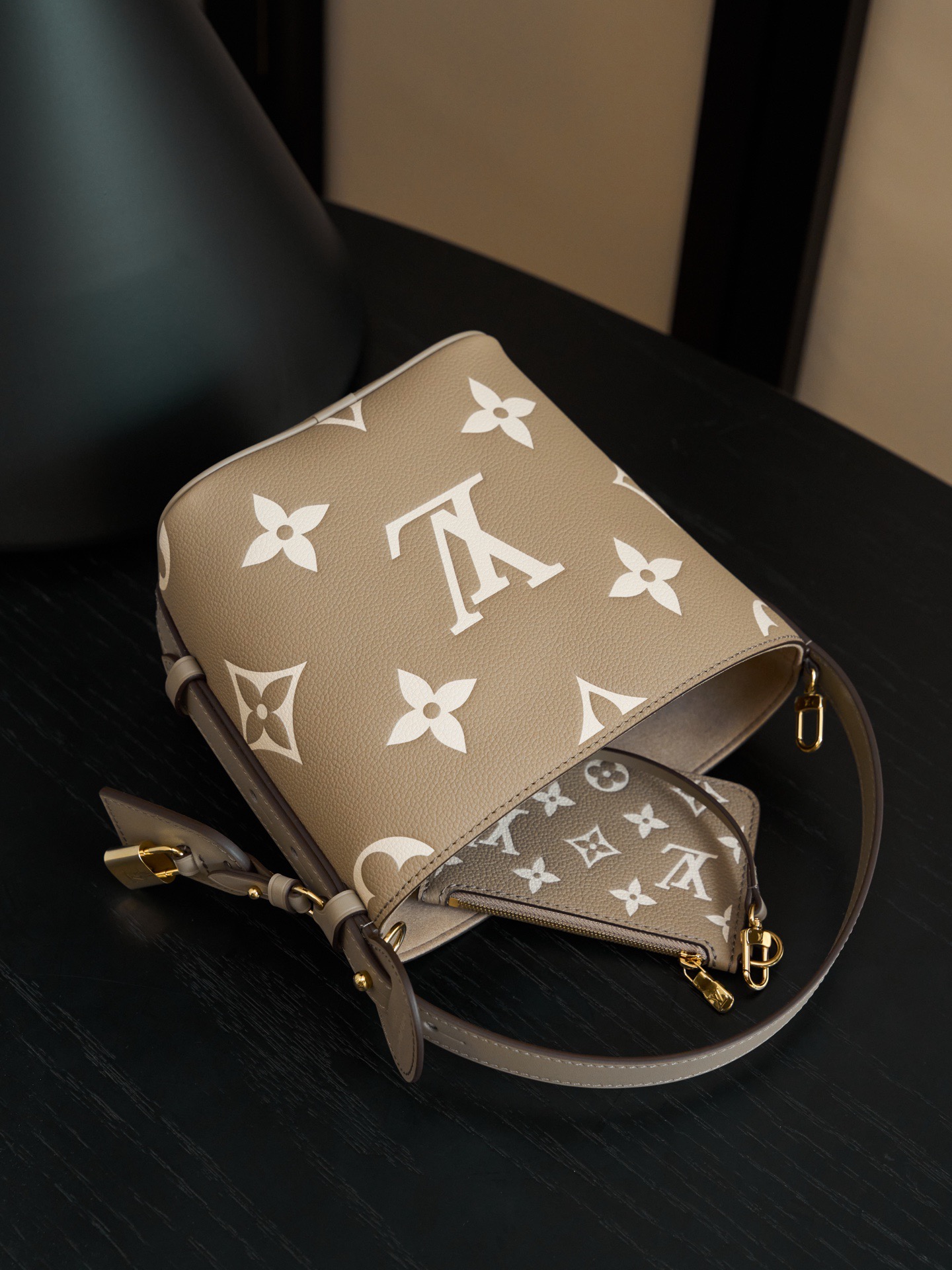 Open view of the Louis Vuitton All In BB with detachable pouch