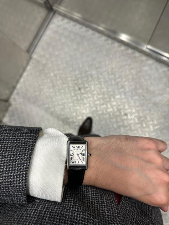 Cartier Tank worn with white cuff