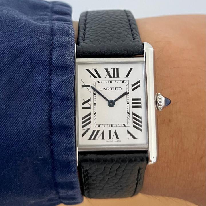 Cartier Tank Must black strap on wrist