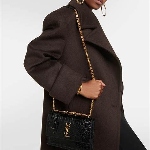 How to Style the Saint Laurent Sunset 22 in Crocodile-Embossed Leather styled with dark coat and simple lines