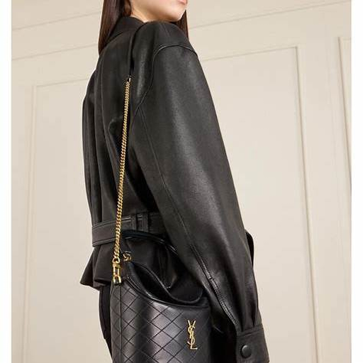 Saint Laurent Gaby Bucket styled with black leather outerwear