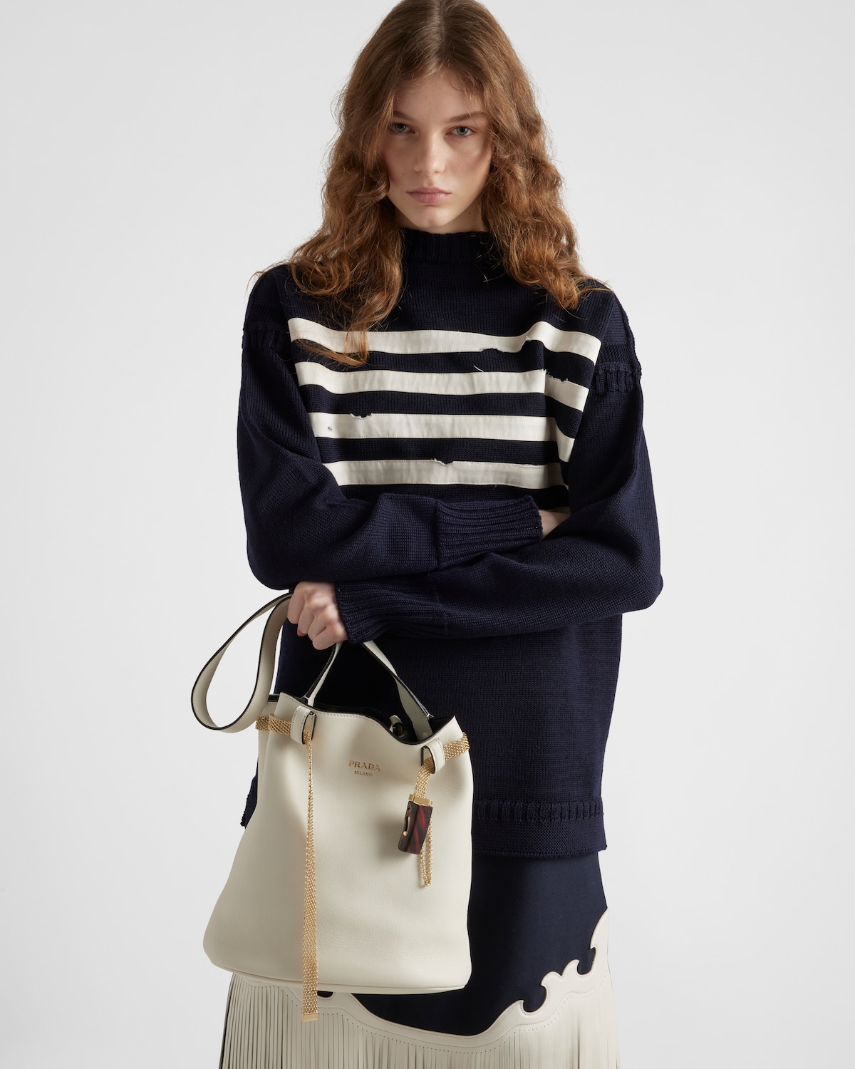 Prada Buckle leather bucket bag with jeweled belt worn by model