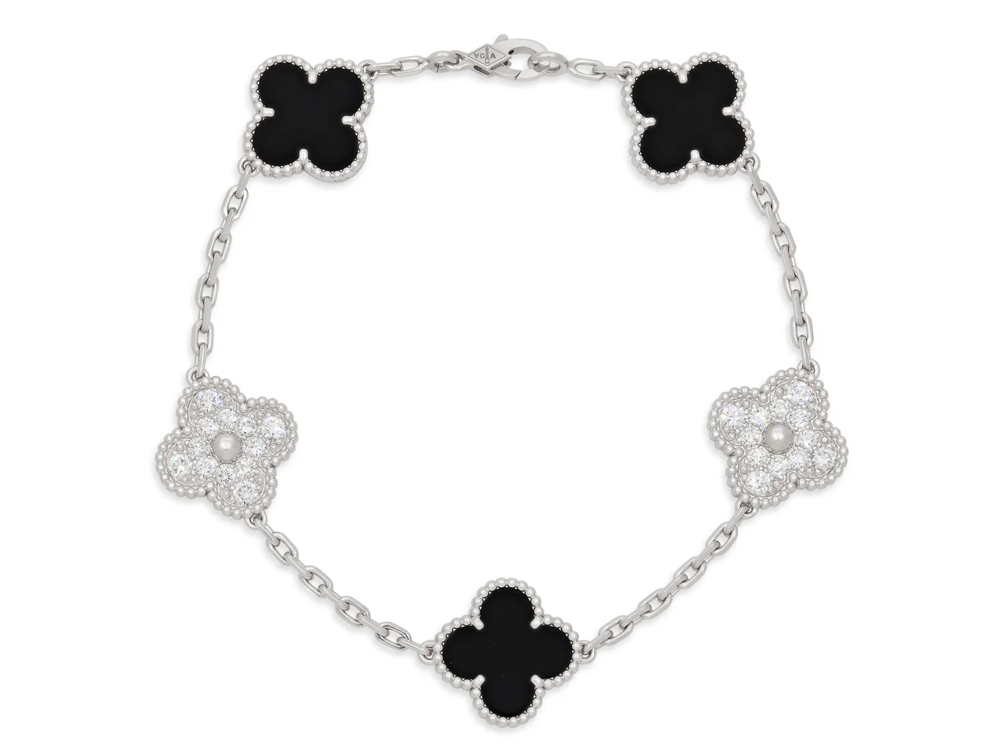 Real-life product photo of Van Cleef & Arpels Vintage Alhambra bracelet in white gold, diamond and onyx